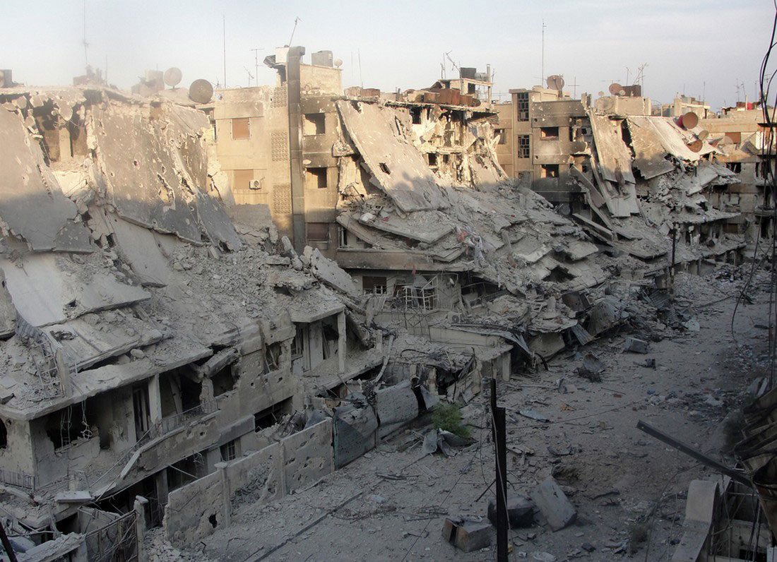 Разрушенные здания в осажденном Хомсе, фото, Сирия